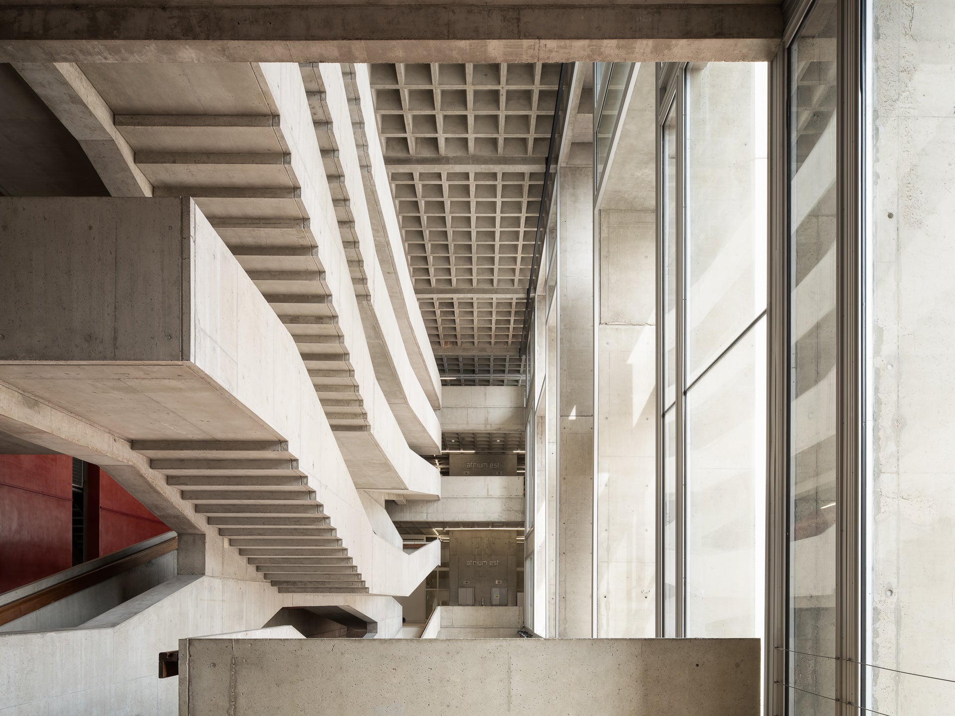 centre-national-danse-pantin-jacques-kalisz-atrium-concrete-stairs-coffered-ceiling-thibaud-poirier