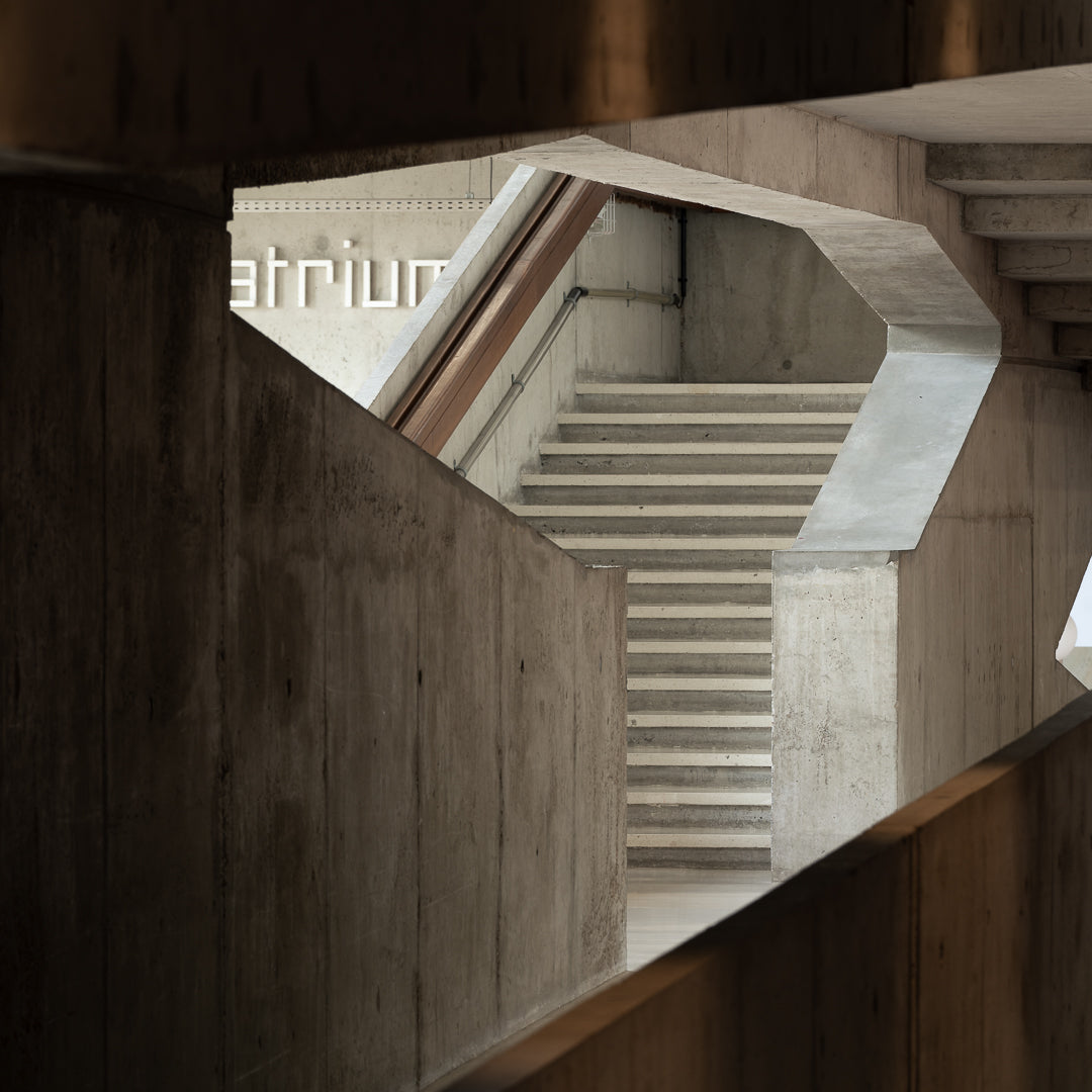 centre-national-danse-pantin-jacques-kalisz-concrete-opening-atrium-stairs-thibaud-poirier