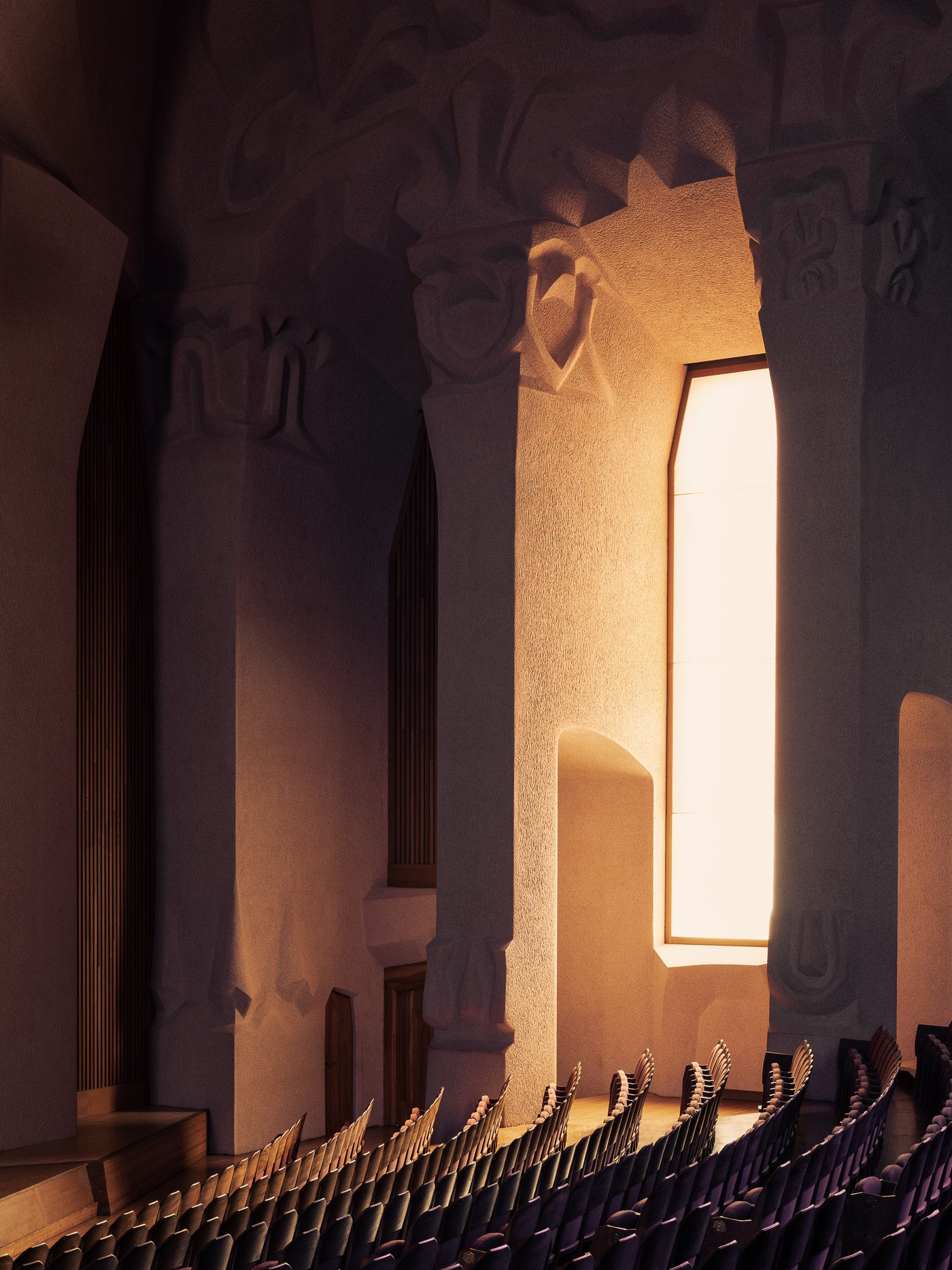 goetheanum rudolf steiner auditorium sculpted columns warm light thibaud poirier