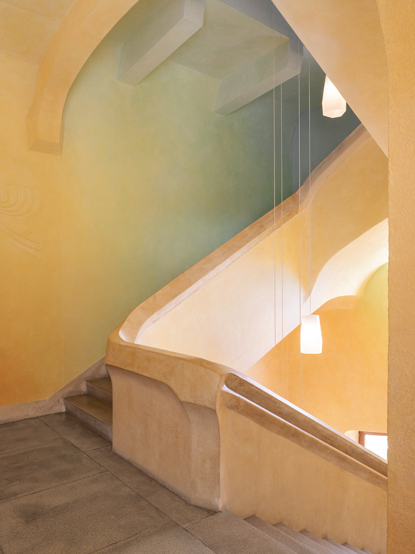 goetheanum rudolf steiner golden stairwell curved archway pendant lights thibaud poirier