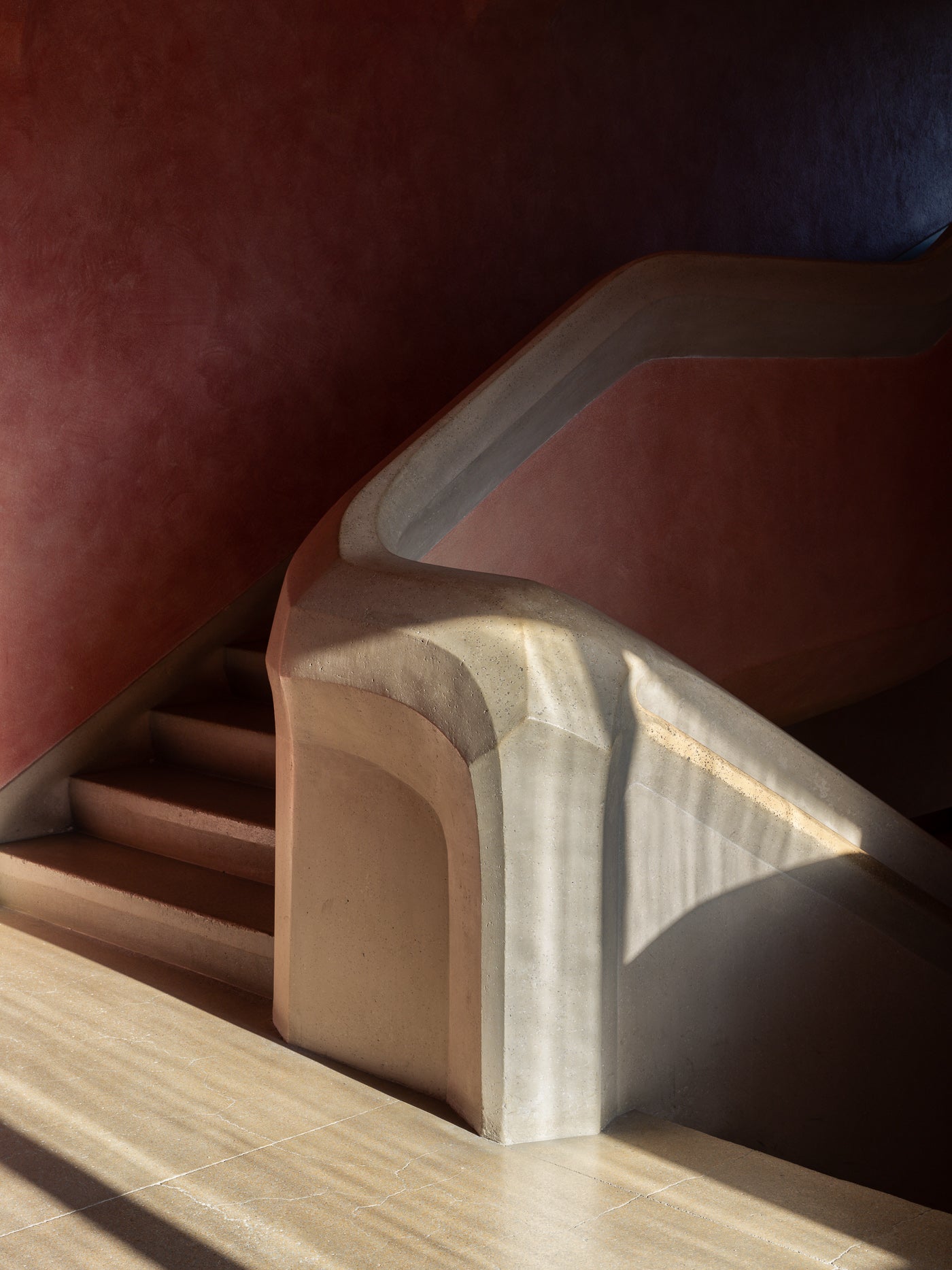 goetheanum rudolf steiner sculptural staircase burgundy walls sunlight thibaud poirier